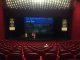 We are in the National Theatre in Bucharest, Romania. Streaming talks of @foss4g, using @c3voc equipment. @infobeamer is with us announcing when the next talks will start and giving an overview of the schedule.