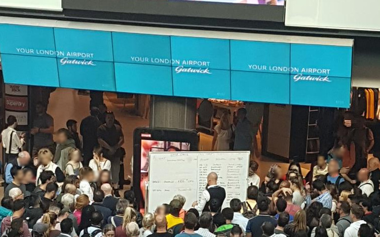 Signs at London Gatwick during the outage